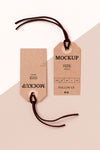 Clothing Size Tag Mock-Up On White And Pink Background Psd