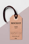 Clothing Size Tag Mock-Up With Black Thread Psd