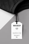 Clothing Size White Mock-Up And Black Towel Psd