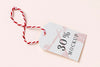Clothing Tag Mock-Up With Red And White Thread Psd