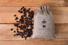 Coffee Bag With Beans Beside Psd