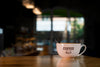 Coffee Cup On Table At Shop Psd