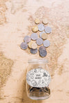 Coins On World Map Psd