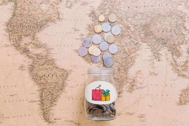 Coins On World Map Psd