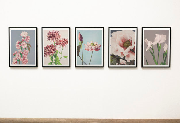 Collection Of Floral Art Pieces On A Wall Psd