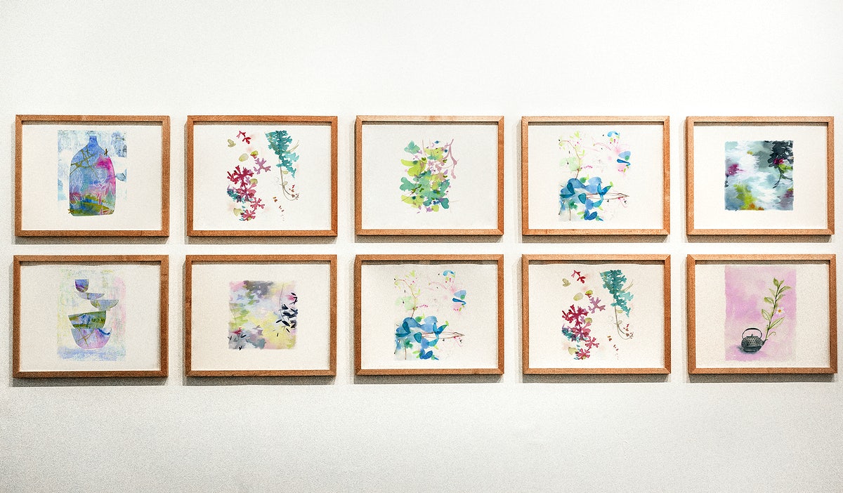 Collection Of Floral Art Pieces On A Wall