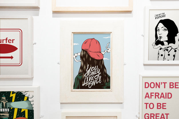 Collection Of Inspirational Artwork On A Wall Psd