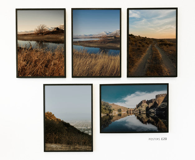 Collection Of Posters On A White Wall Psd