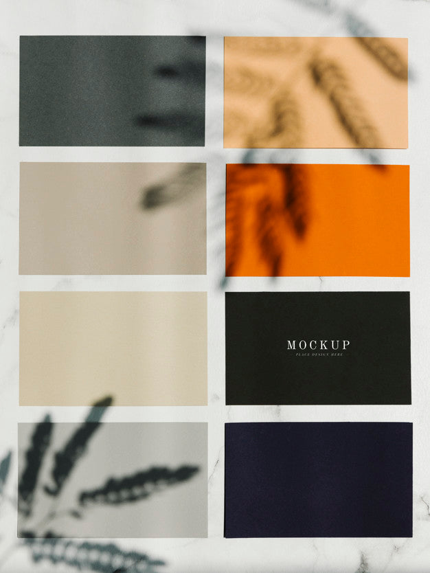 Colored Sample Paper Square Mockups On A Marble Table Psd