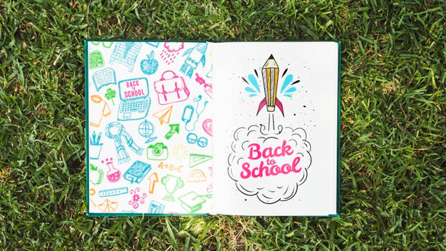 Colorful Book On Grass Mock-Up Psd