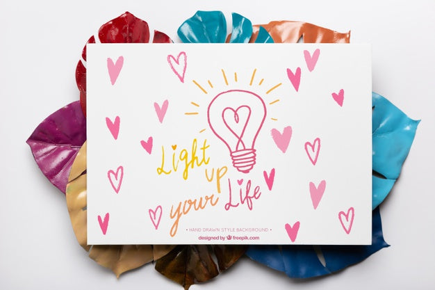 Colorful Painted Leaves With Paper On Top Psd