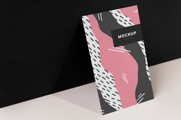 Colorful Paperboard Mockup Against The Black Wall Psd