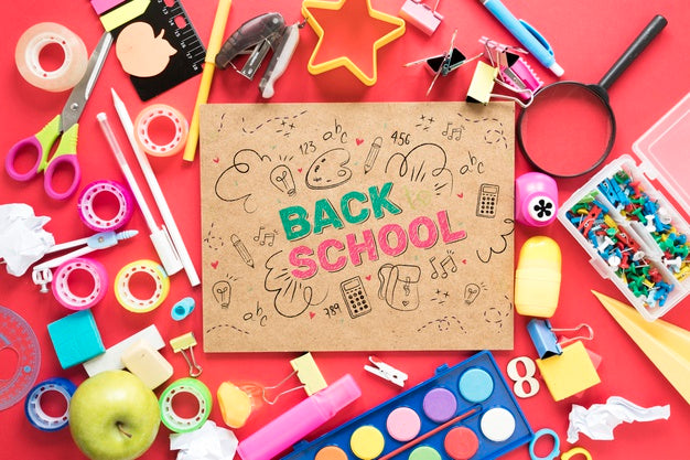 Colourful Supplies For School On Red Background Psd