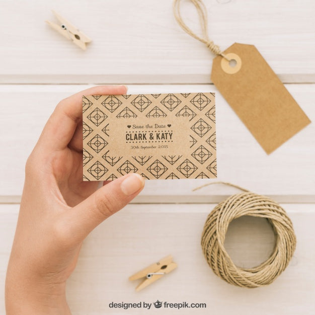 Complements And Hand Holding A Wedding Card Template Psd