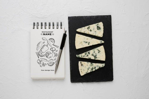 Composition Of Delicious Cheese With Notepad Mock-Up Psd