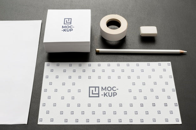 Composition Of Mock-Up Stationery On Wood Psd