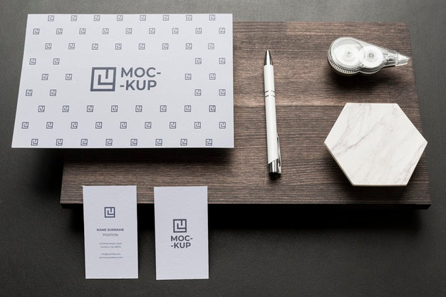 Composition Of Mock-Up Stationery On Wood Psd