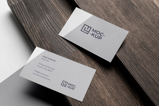 Composition Of Mock-Up Stationery On Wood Psd