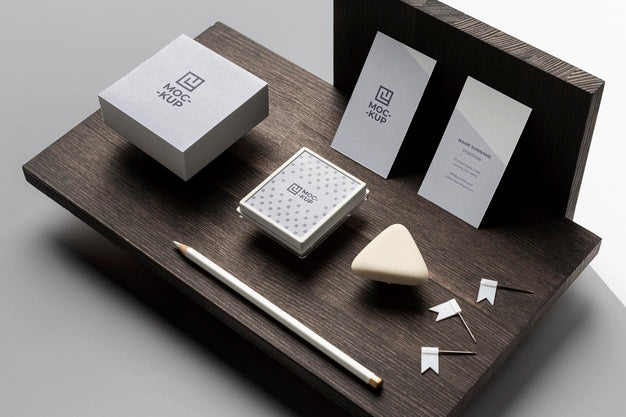 Composition Of Mock-Up Stationery On Wood Psd