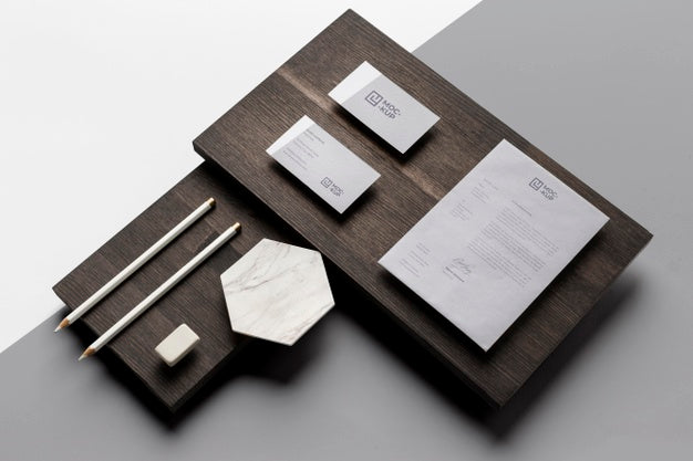 Composition Of Mock-Up Stationery On Wood Psd