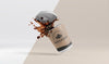 Composition Of Paper Coffee Cup With Coffee Splash Psd