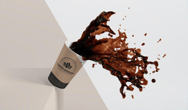 Composition Of Paper Coffee Cup With Coffee Splash Psd
