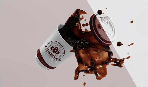 Composition Of Paper Coffee Cup With Coffee Splash Psd