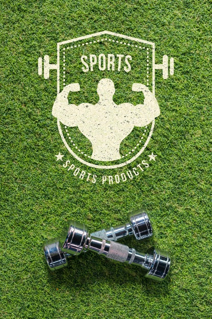 Copyspace Mockup On Grass With Dumbbells Psd