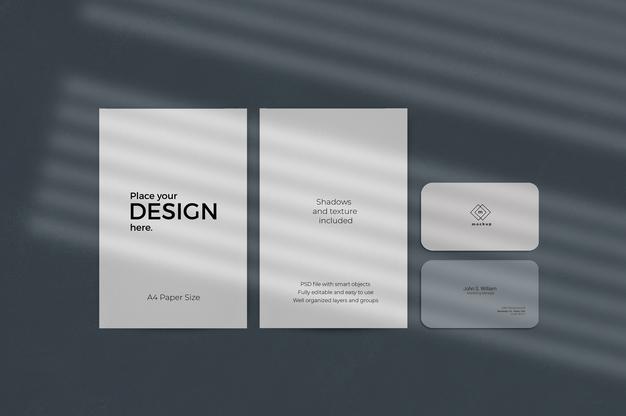 Corporate Stationary Set Mockup With Window Shadow Effect On Blue Wall Psd