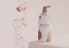 Cosmetic Product Bottle And Bubbles Psd