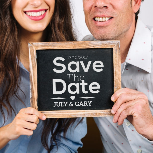 Couple Holding Slate Psd
