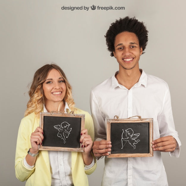 Couple Holding Slates Psd