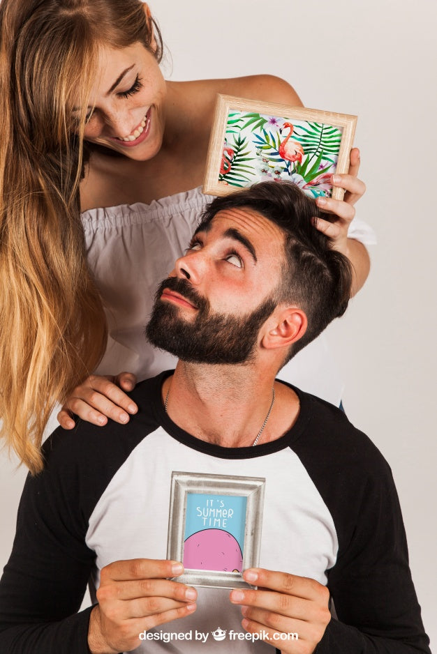 Couple Presenting Frames Psd