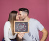 Couple Presenting Slate Mockup Psd