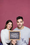 Couple Presenting Slate Mockup Psd