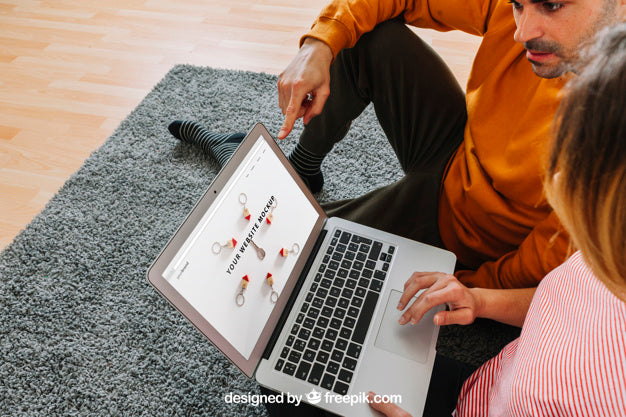 Couple Using Laptop Psd