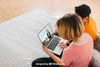 Couple With Laptop In Bed Psd