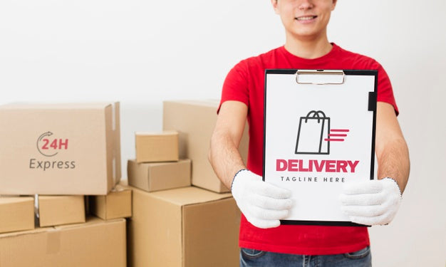 Courier Holding Clipboard In Front Of Parcels Mock-Up Psd