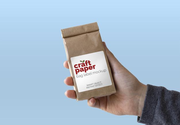 Craft Paper In Hand Mockup Psd