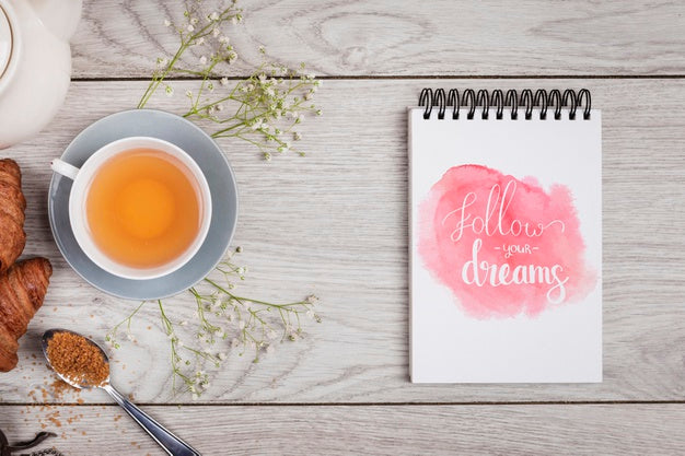 Cup Of Tea Next To Notepad Mock-Up Psd