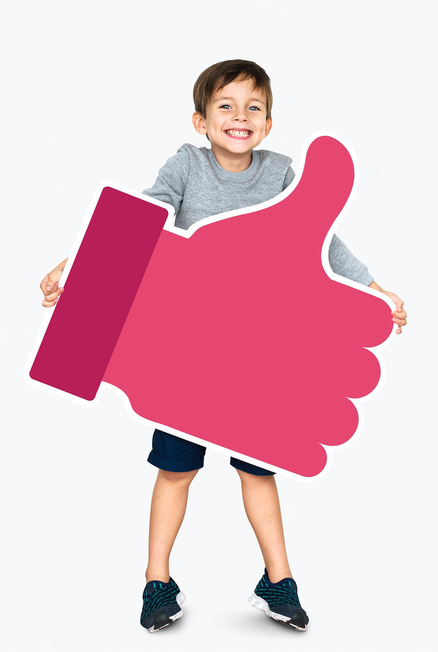 Cute Little Kid Holding A Pink Thumbs Up Icon