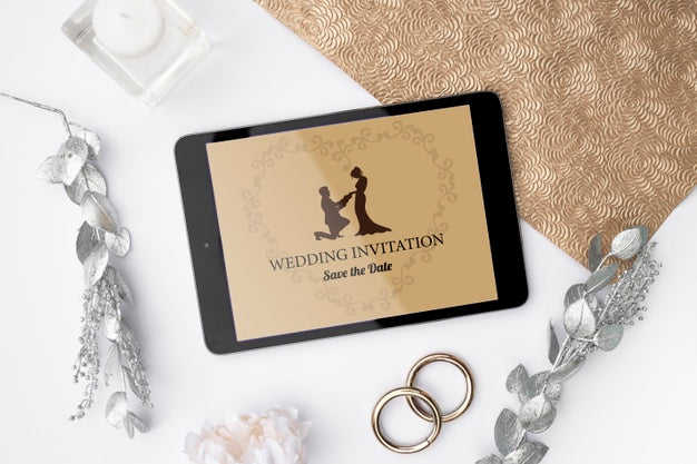 Cute Wedding Invitation On A Tablet Psd
