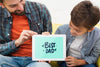 Dad And Son Holding Electronic Tablet Psd