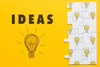 Decoration With Puzzle Pieces On Yellow Background Psd