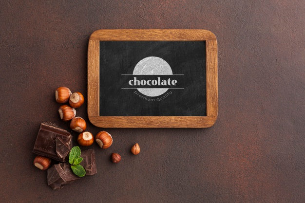 Delicious Chocolate With Blackboard Mock-Up On Brown Background Psd