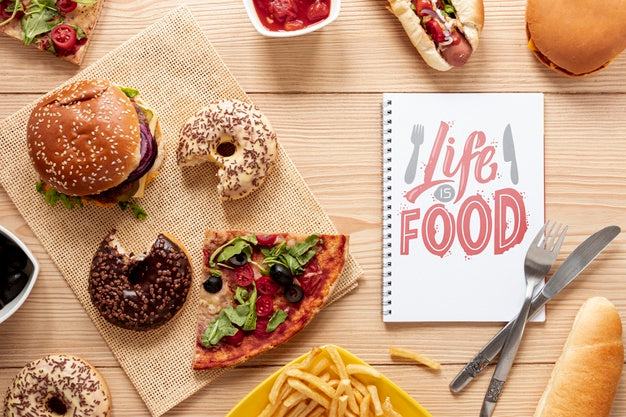 Delicious Fast Food On Wooden Table With Notebook Mock-Up Psd