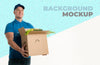 Delivery Man Holding A Box Full Of Vegetables Psd