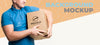 Delivery Man Holding A Box Mock-Up Psd