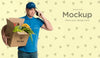 Delivery Man Holding A Box With Vegetables Mock-Up Psd