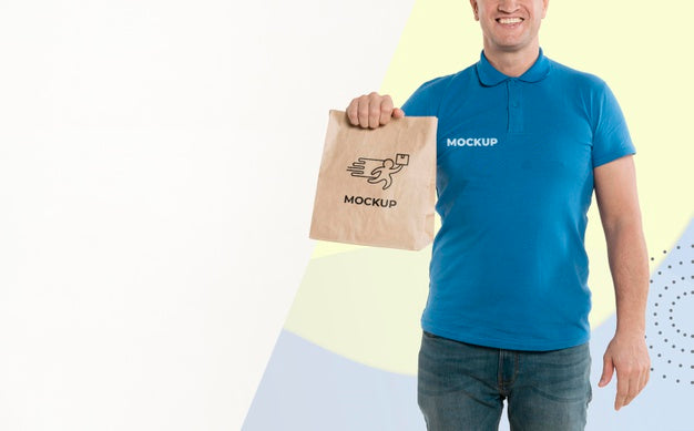 Delivery Man Holding A Shopping Bag With Copy Space Psd